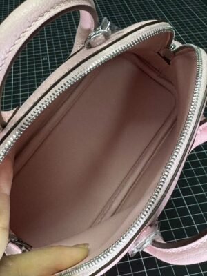 Hermès Bolide 1923 25 in delicate Rose Sakura (3Q Pink) Chevre (Goatskin), a timeless blend of vintage charm and modern elegance. - Image 8