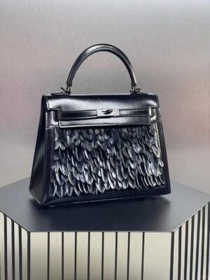Hermès Kelly Feather Bag in sleek Noir (Black) Box Calf leather with hand-applied feather detailing, a dramatic fusion of iconic design and avant-garde artistry. - Image 6