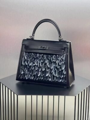 Hermès Kelly Feather Bag in sleek Noir (Black) Box Calf leather with hand-applied feather detailing, a dramatic fusion of iconic design and avant-garde artistry. - Image 4
