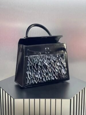 Hermès Kelly Feather Bag in sleek Noir (Black) Box Calf leather with hand-applied feather detailing, a dramatic fusion of iconic design and avant-garde artistry. - Image 3
