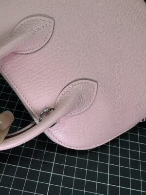 Hermès Bolide 1923 25 in delicate Rose Sakura (3Q Pink) Chevre (Goatskin), a timeless blend of vintage charm and modern elegance. - Image 5