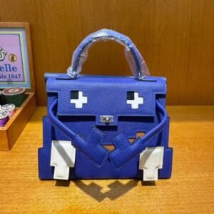 Hermès Kelly Doll Bag in iconic Etoupe Epsom leather with playful patchwork details, a whimsical blend of Hermès heritage and contemporary charm - Image 4