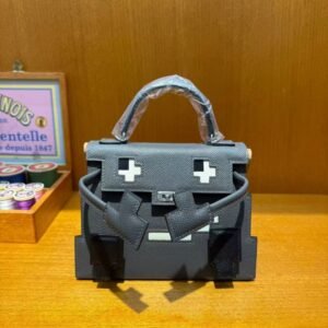 Hermès Kelly Doll Bag in iconic Etoupe Epsom leather with playful patchwork details, a whimsical blend of Hermès heritage and contemporary charm - Image 5