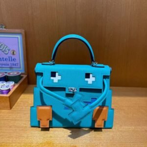 Hermès Kelly Doll Bag in iconic Etoupe Epsom leather with playful patchwork details, a whimsical blend of Hermès heritage and contemporary charm - Image 6