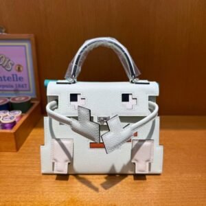 Hermès Kelly Doll Bag in iconic Etoupe Epsom leather with playful patchwork details, a whimsical blend of Hermès heritage and contemporary charm - Image 8